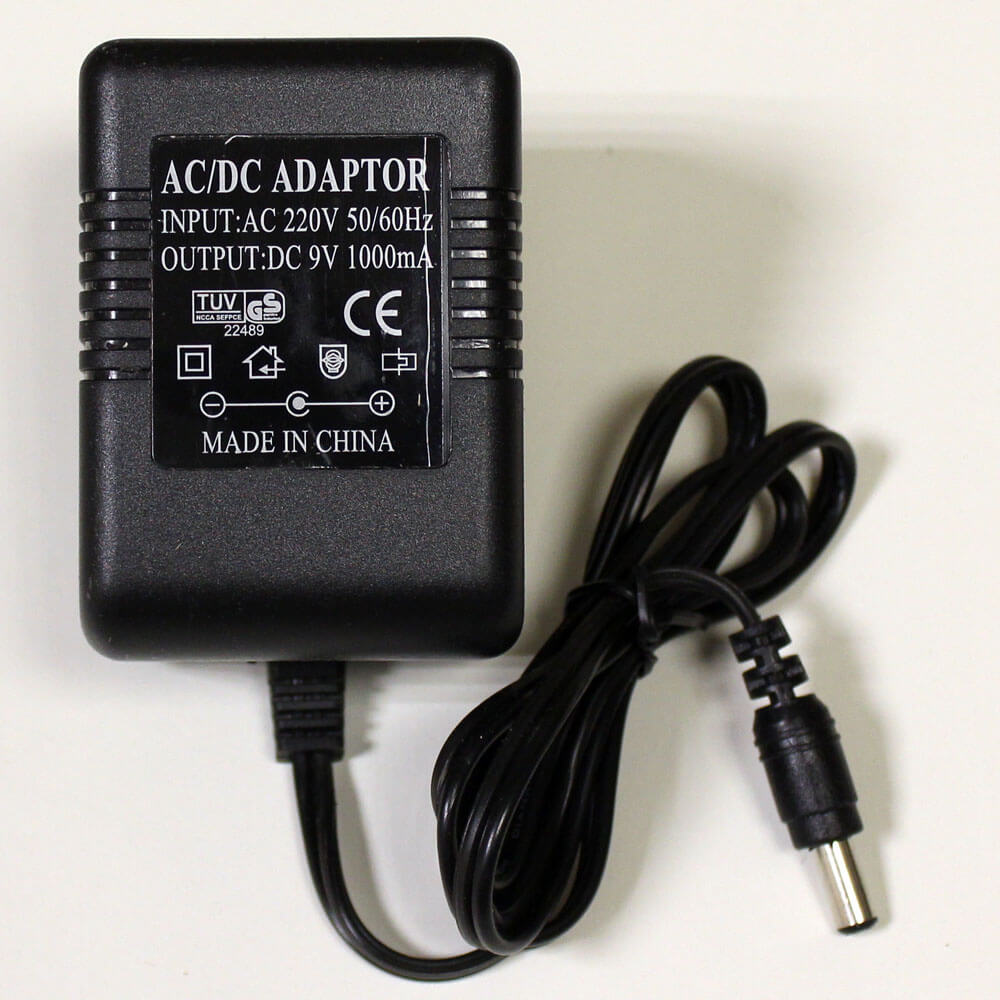 Блок питания не стабил. трансф. 9V 1A  AC/DC шт2,5*5,5мм